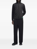 FLÂNEUR Badge Technical panelled zip-up jacket